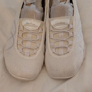 Skechers Women's White Slip-On Sneakers